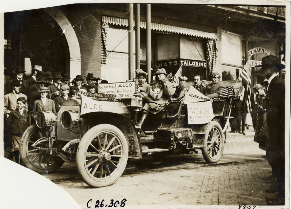 Motorists posing in Alco official car in front of the Hotel Chiquola at Anderson, South Carolina during the 1909 Good Roads Tour